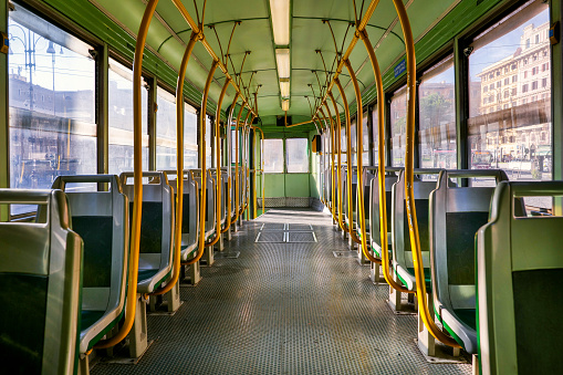 The interior of an ancient and old-style tramway of the Rome public transport line. Image in High Definition format.