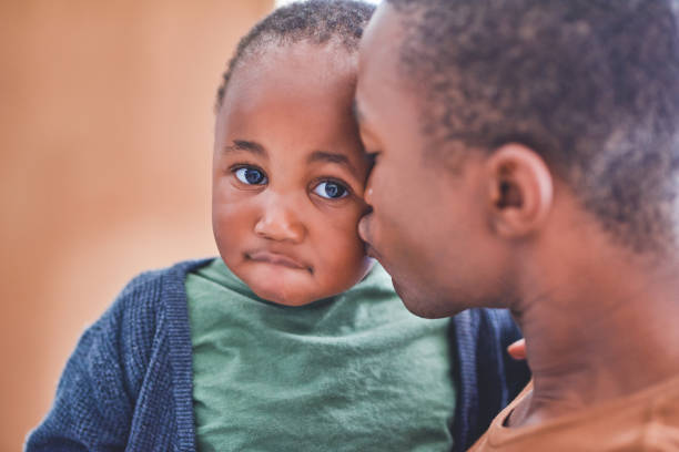 istock A loving father raises a loving son 1306162295