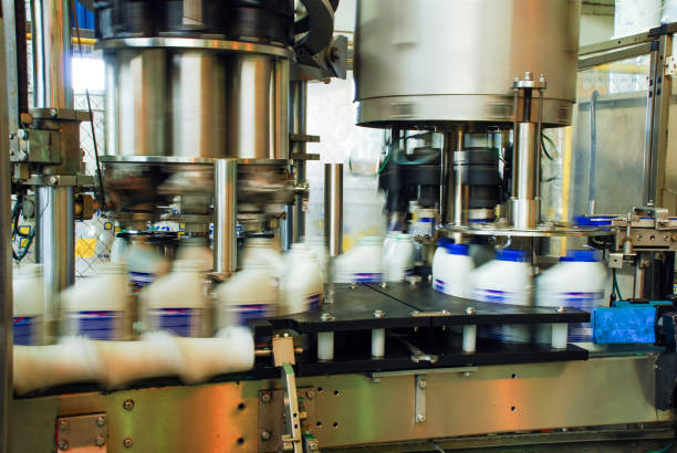 istock Oil is dispensed into quart bottles 1306165542