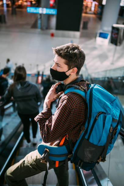 istock Solo Traveler Heading to a Flight Gate 1306167238