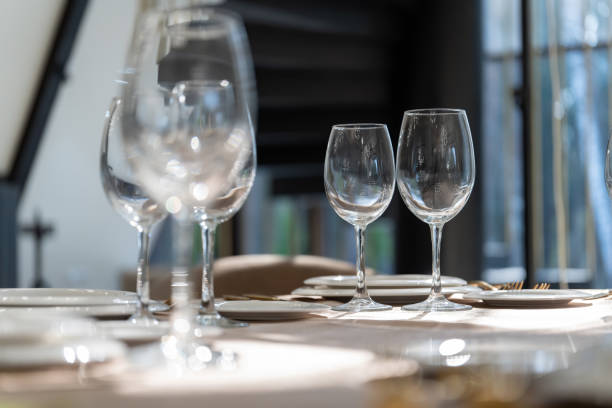 istock Beautiful table setting with glasses, plates and napkins. General form-2. 1306168222