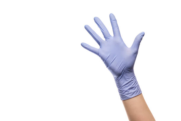 istock Gesture number five hand with latex glove on white isolated background. 1306175323