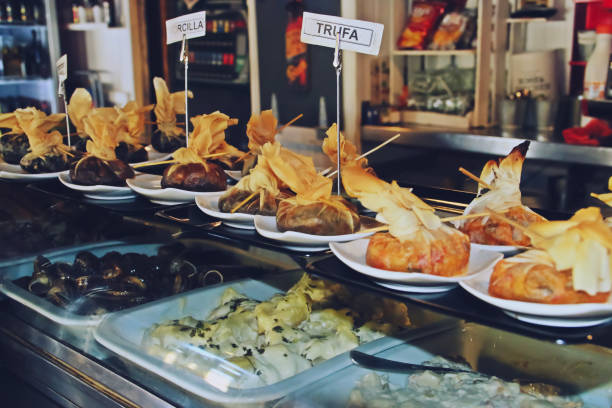 istock Tapas displayed in a bar to be sold. 1306175890