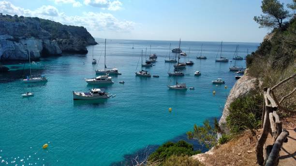 istock Few boats in the sea 1306178390