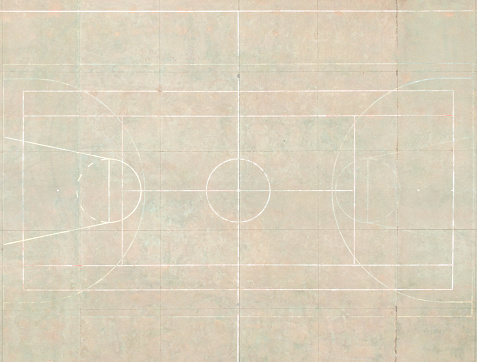 aerial drone view of the lines of different sports painted on the floor of a sports center. Zenithal view. View from above.