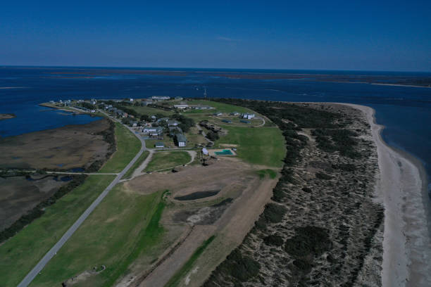 Aerial view of Fort Caswell Aerial view of Fort Caswell. Where the cape fear rivers meets the Atlantic ocean. Bald Head Island is in the distance. cape fear stock pictures, royalty-free photos & images