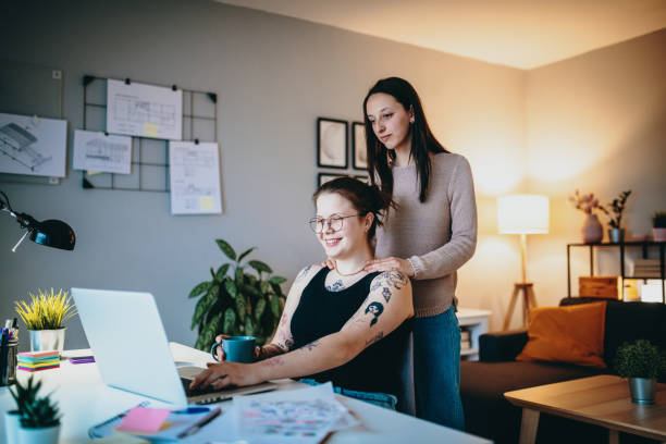 istock Lesbian couple working from home and sharing love 1306183968