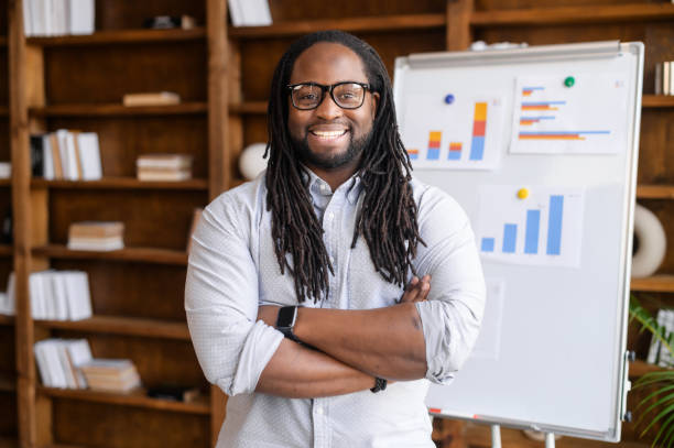 istock An African-American guy with a flipchart 1306184937
