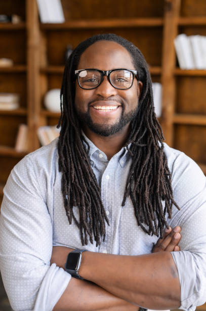 istock Smiling African-American guy looks at the camera 1306184943