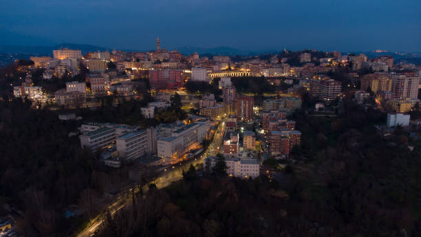 istock Italian city night lights aerial view 1306186695
