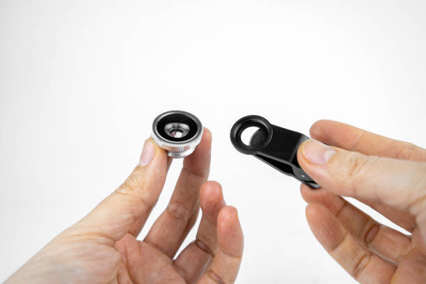 istock Phone photo lens with clips on white background. Extra macro camera for smartphone 1306186834