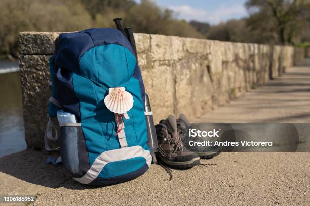 Backpack With Seashell Symbol Of Camino De Santiago Stock Photo - Download Image Now