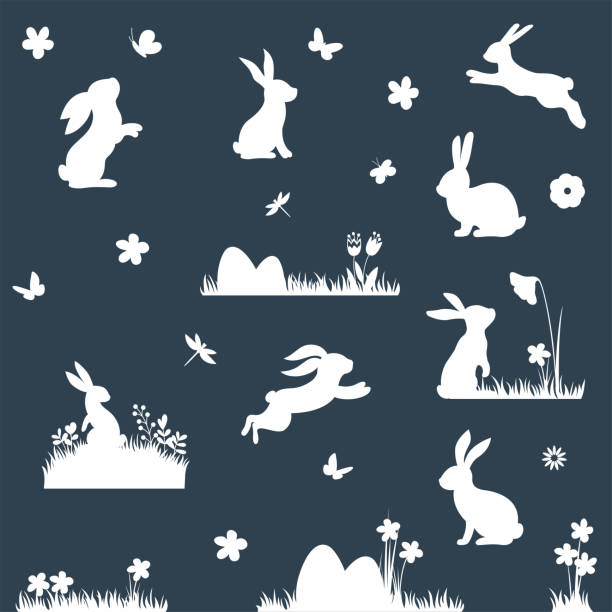 Set of different bunnies silhouettes, flowers, butterflies for easter card. Easter elements. Set of different bunnies silhouettes, flowers, butterflies for easter card. Easter elements. easter silhouettes stock illustrations