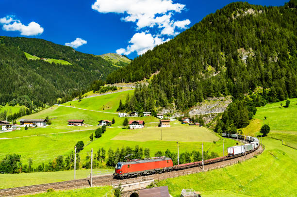 istock Trucks crossing the Alps by rail in Austria 1306191754
