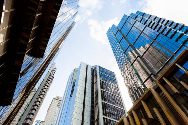 istock Low angle view of modern office buildings, skyscrapers, sky background with copy space 1306193754