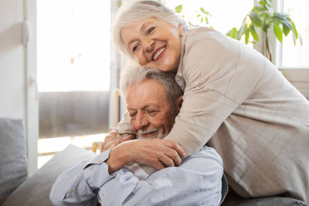 istock Senior couple embracing 1306195634