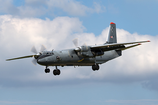 Gloucestershire, UK - July 11, 2014: Hungarian Air Force Antonov An-26 military transport aircraft on approach to land at RAF Fairford.