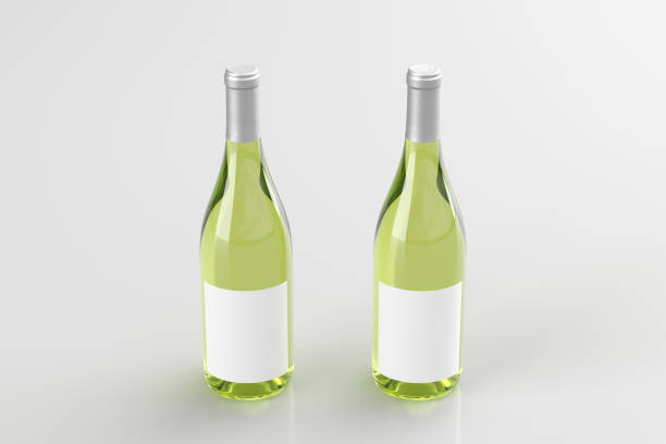 istock Two white wine bottles 750ml mock up with blank label on white background. 1306196986