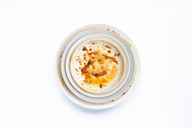 istock Dirty dishes on white background. Top view 1306197256