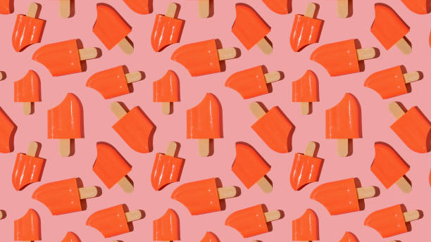 istock A pattern of red nibbled popsicle on a red background. 1306203150