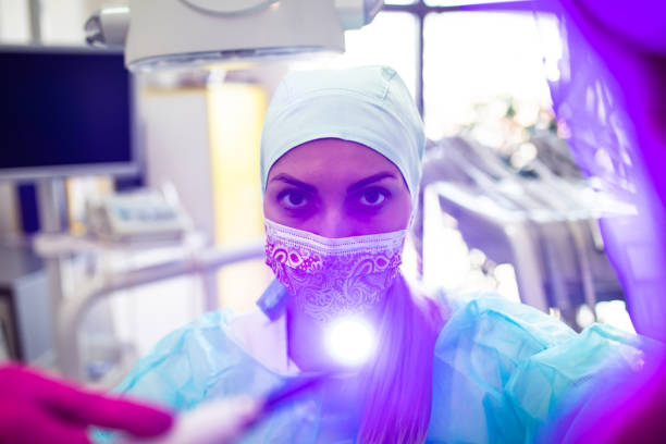 istock Dental blue light, patient point of view 1306203337