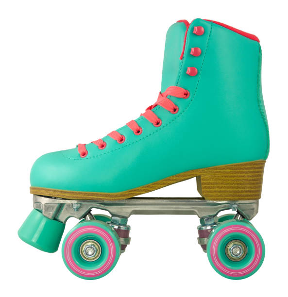 Isolated Retro Roller Skate A Brightly Colored Retro Roller Skate Isolated On A White Background skating photos stock pictures, royalty-free photos & images
