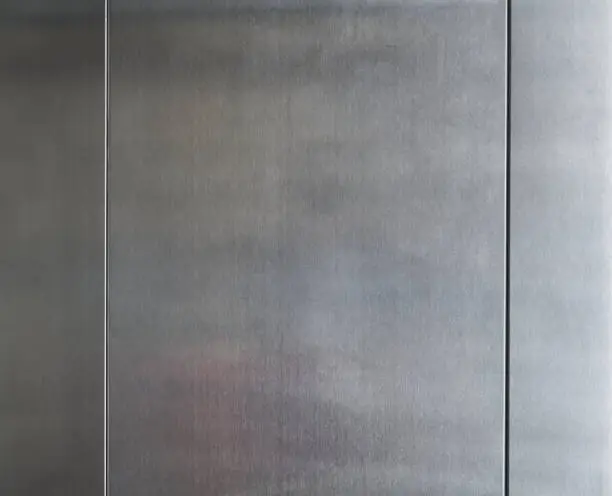 Photo of stainless steel panels belonging to an elevator wall
