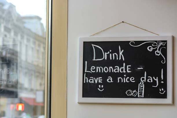 istock Chalk on the blackboard Drink lemonade have a nice day 1306206992