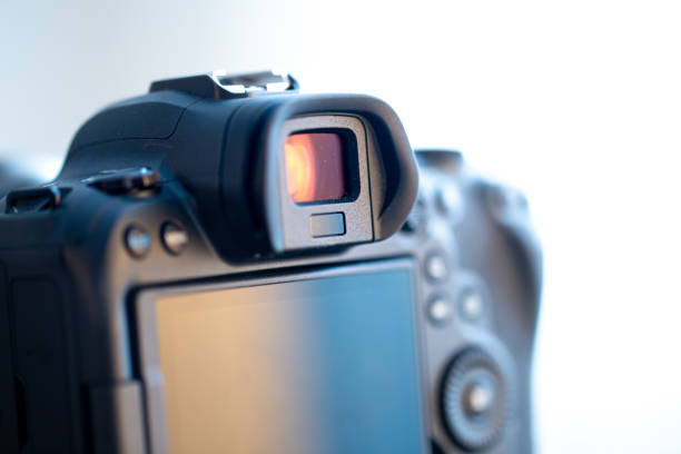 istock Close up part of a professional digital camera on a blurred background. 1306208298