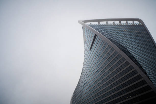 istock Top of skyscraper on grey sky 1306208450
