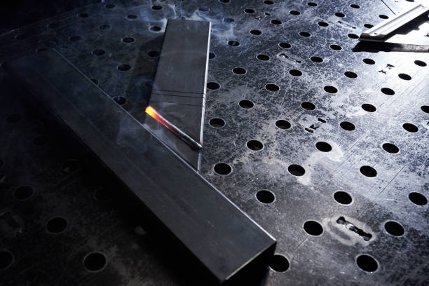 istock A red hot weld between two pieces of a metal pipe cools down 1306208536