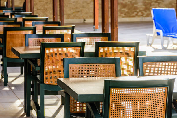 istock Chairs and tables in a cozy street cafe 1306210208