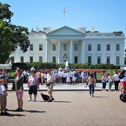 People visit White House in Washington. 18.9 million tourists visited capital of the United States in 2012.