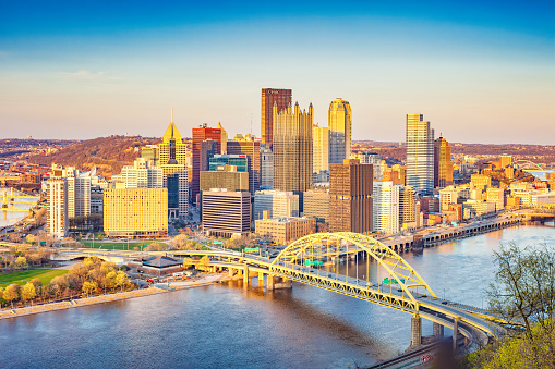 Skyline of Pittsburgh Pennsylvania, Fort Pitt Bridge and the Monongahela River, USA on a sunny day.