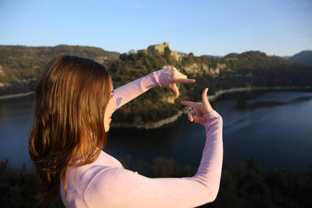 Woman framing in a river on vacation