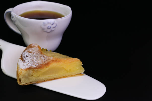 istock Close up Pear Tart , black background 1306226085