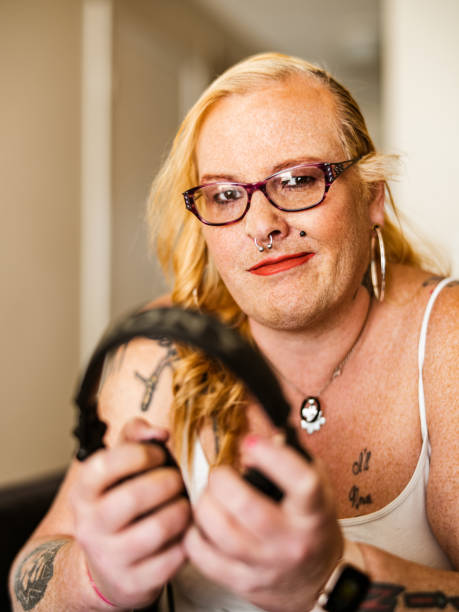 istock Transgender woman dj at home 1306226863