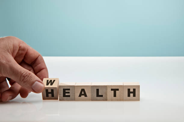 istock Blocks on Blue Background symbolizing Health Care 1306229927