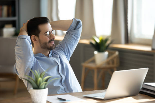 istock Businessman lean on comfortable office chair resting at workplace 1306230765