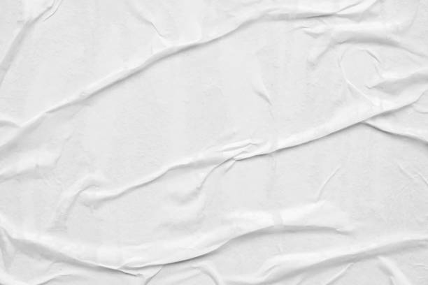 istock Blank white crumpled and creased paper poster texture background 1306230828