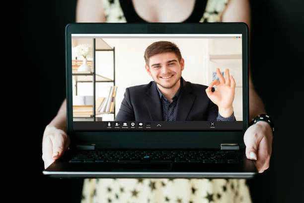 istock video call online conference business man laptop 1306230885
