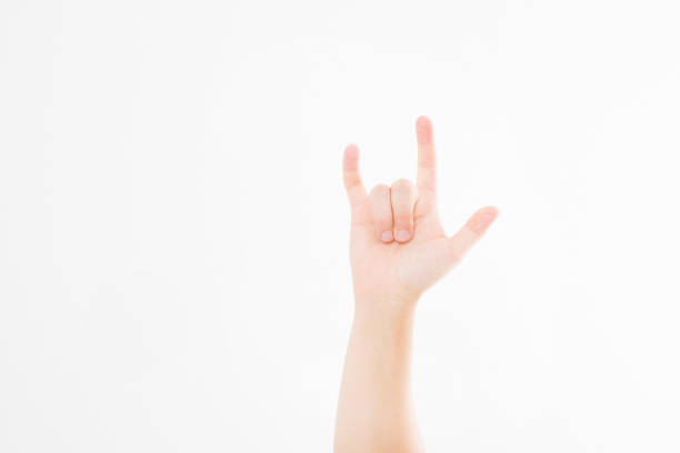 istock Man hand sign isolated on white background. Drive concept. Rock gesture, copy space. 1306233826