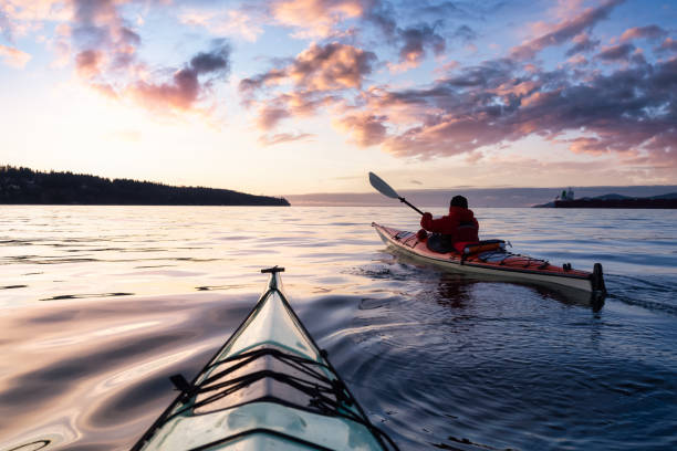 istock Adventurous Man Sea Kayaking in the Pacific Ocean. 1306238108