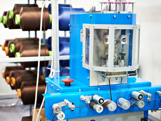 istock Bobbins of thread for cord knitting machine 1306238803