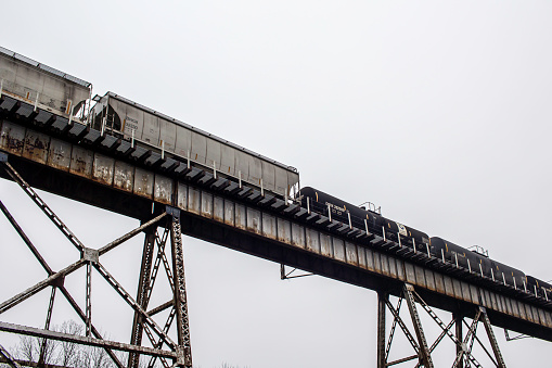 February 27, 2021 - Nashville, Tennessee, U.S.: A freight train runs along a train trestle in Shelby park.