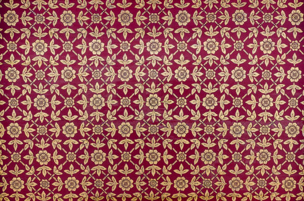 istock Thai Ornamental Pattern with Gold Leaf On Ceiling of Temple of Wat Pho Monastery. 1306244462