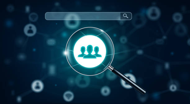 istock Search Engine Optimisation - SEO - with Magnifying glass on Network and Social Media 1306248258