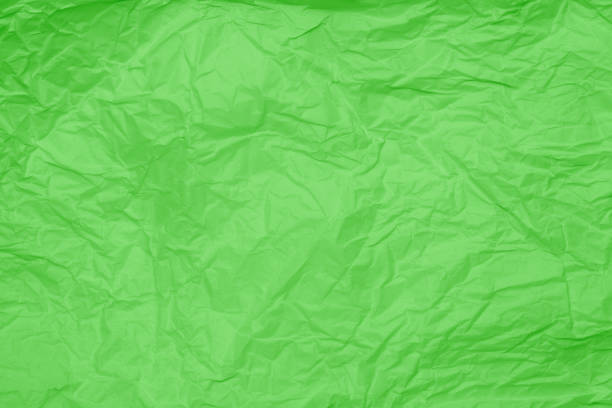 istock Close up texture of crumpled paper in natural light 1306249113