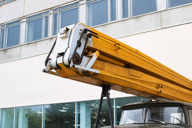 istock Part of large car with construction crane 1306251489