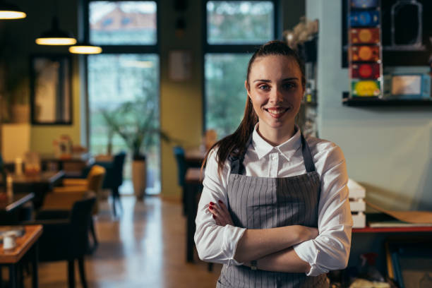 istock waitress working in restaurant or cafe 1306252770